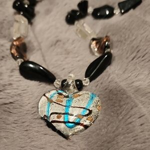 Elegant Heart Pendant Necklace with Black and Blue Accents